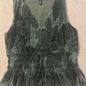 Green Sleeveless Top with Metallic Accents